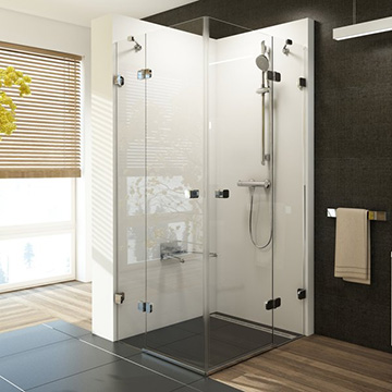 Corner shower enclosures